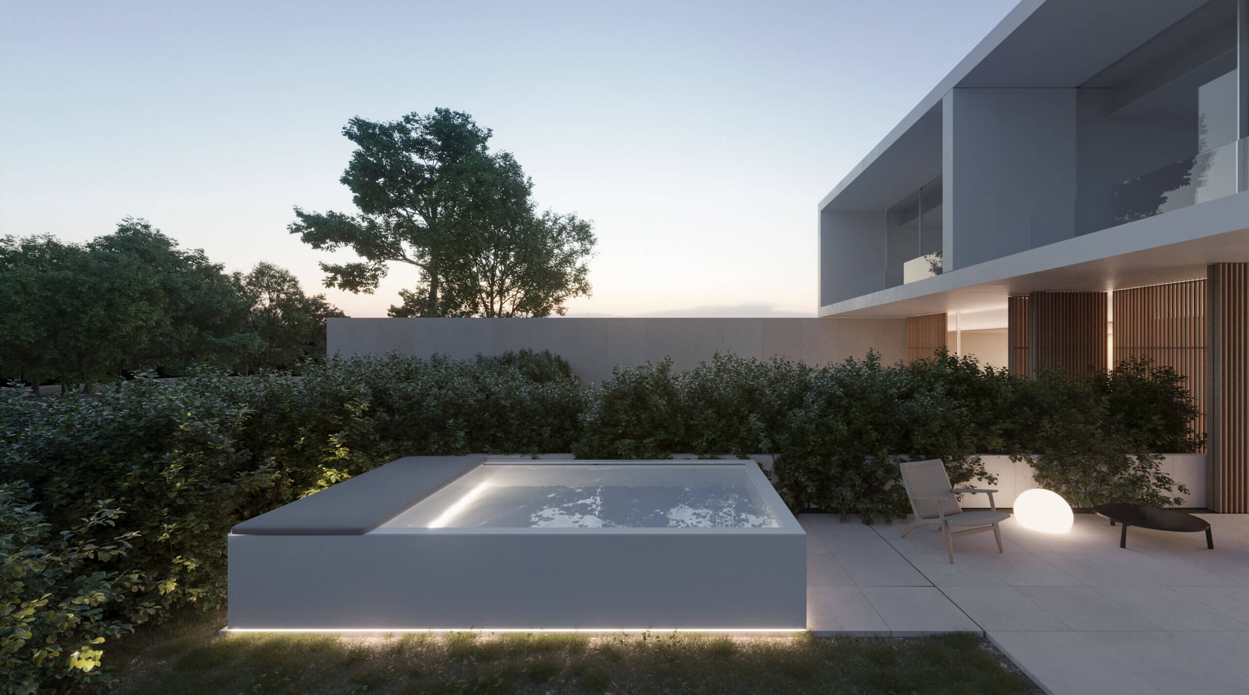 Piscine hors sol dans un jardin de nuit